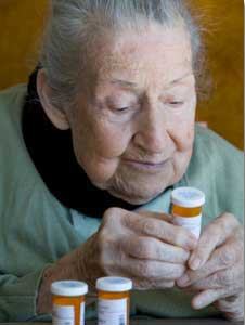 woman with pill bottle