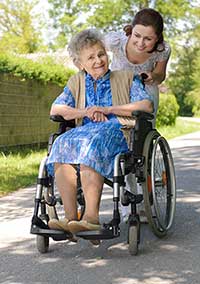 lady in wheelchair with caregiver