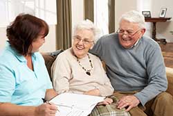 couple talking with homecare representative