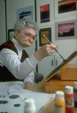 woman painting a picture