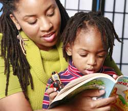 mother reading story to child