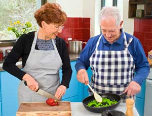 senior couple cooking together