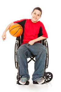 youth in wheelchair with basketball